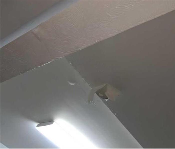 garage ceiling falling from water damage 